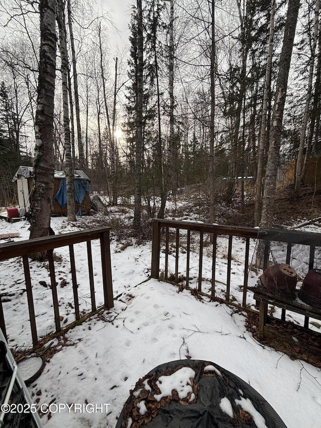 view of snow covered deck