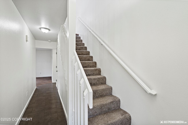 stairway with baseboards