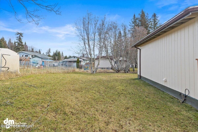 view of yard featuring fence