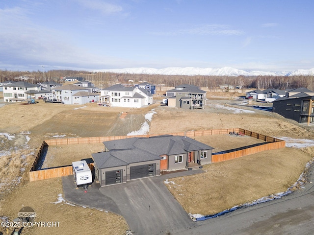 bird's eye view featuring a residential view and a mountain view