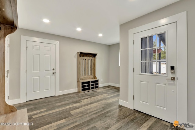 entrance foyer with recessed lighting, wood finished floors, and baseboards