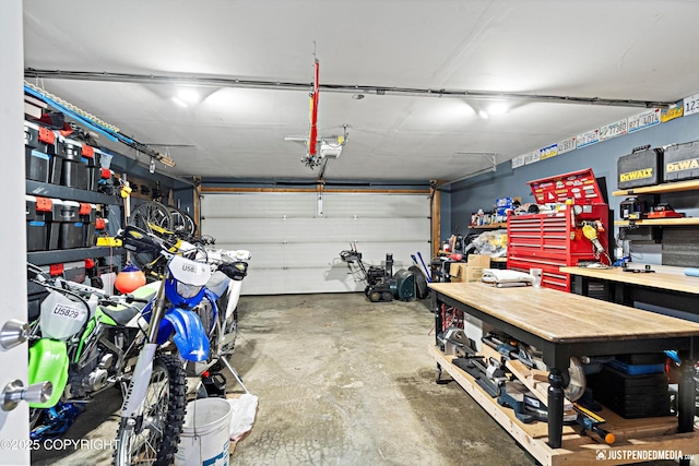 garage with a workshop area