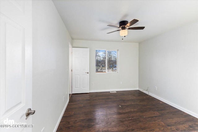 2050 Totem Rd, Wasilla, AK 99654 - unfurnished room featuring ceiling fan, baseboards, and wood finished floors
