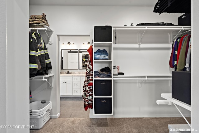 spacious closet featuring carpet