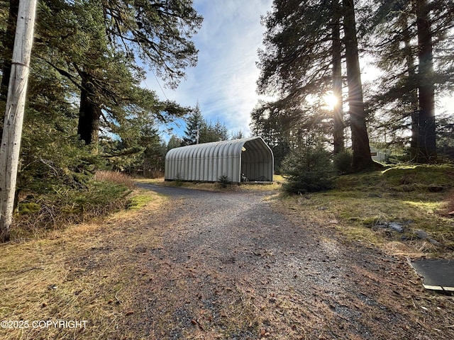 exterior space featuring gravel driveway