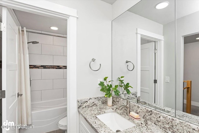 full bath featuring toilet, recessed lighting, vanity, and shower / tub combo with curtain