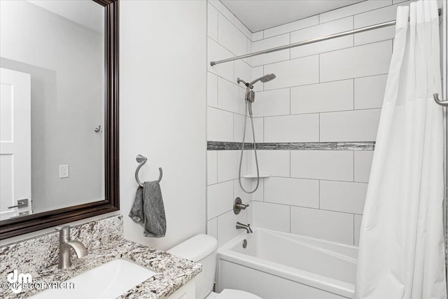 full bathroom with shower / bath combo with shower curtain, vanity, and toilet