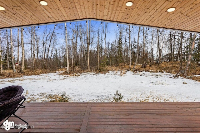 view of snow covered deck