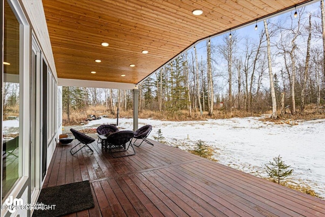 view of snow covered deck