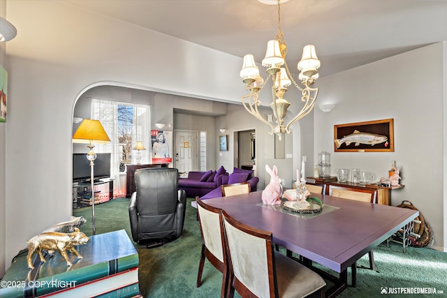 dining space with arched walkways, carpet floors, and a notable chandelier