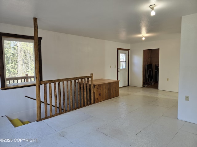 unfurnished room with a wealth of natural light