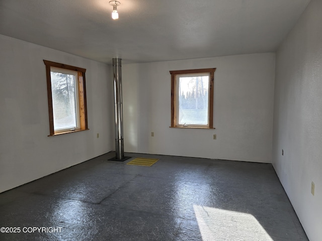 unfurnished room with plenty of natural light