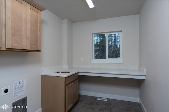 laundry room with cabinet space, hookup for an electric dryer, visible vents, and baseboards