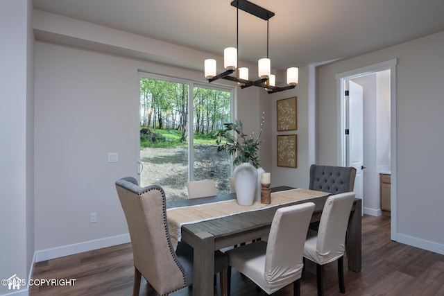 14311 Pickett St, Anchorage, AK 99516 - dining room featuring a chandelier and dark wood-style floors