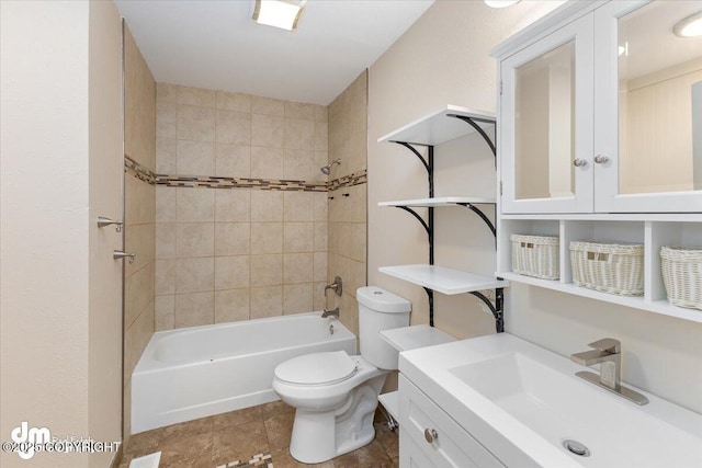 bathroom with vanity, shower / bathing tub combination, and toilet