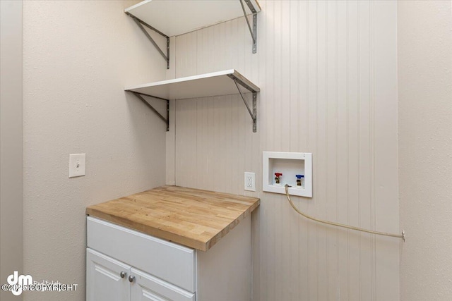 laundry area featuring cabinet space and hookup for a washing machine