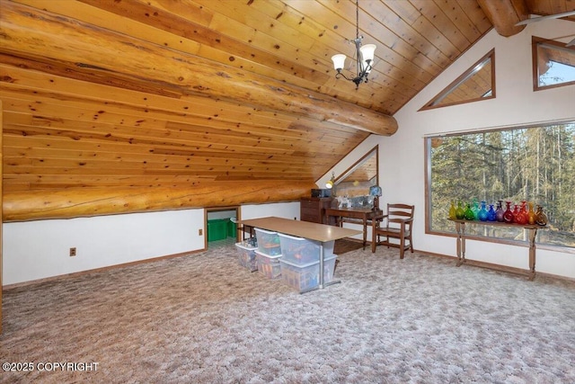 additional living space with vaulted ceiling with beams, baseboards, a chandelier, and carpet flooring