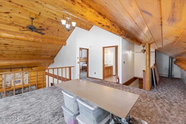 interior space featuring lofted ceiling with beams, wooden ceiling, log walls, carpet flooring, and ceiling fan with notable chandelier