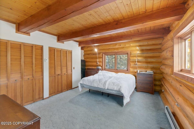 bedroom with rustic walls, multiple windows, a baseboard heating unit, and beamed ceiling