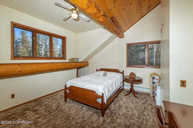 bedroom with a ceiling fan, carpet, lofted ceiling with beams, and baseboards