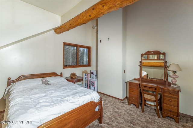 carpeted bedroom with lofted ceiling with beams and baseboards