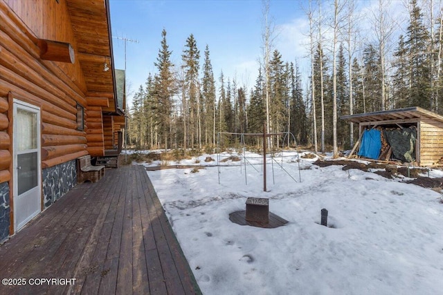 view of snow covered deck