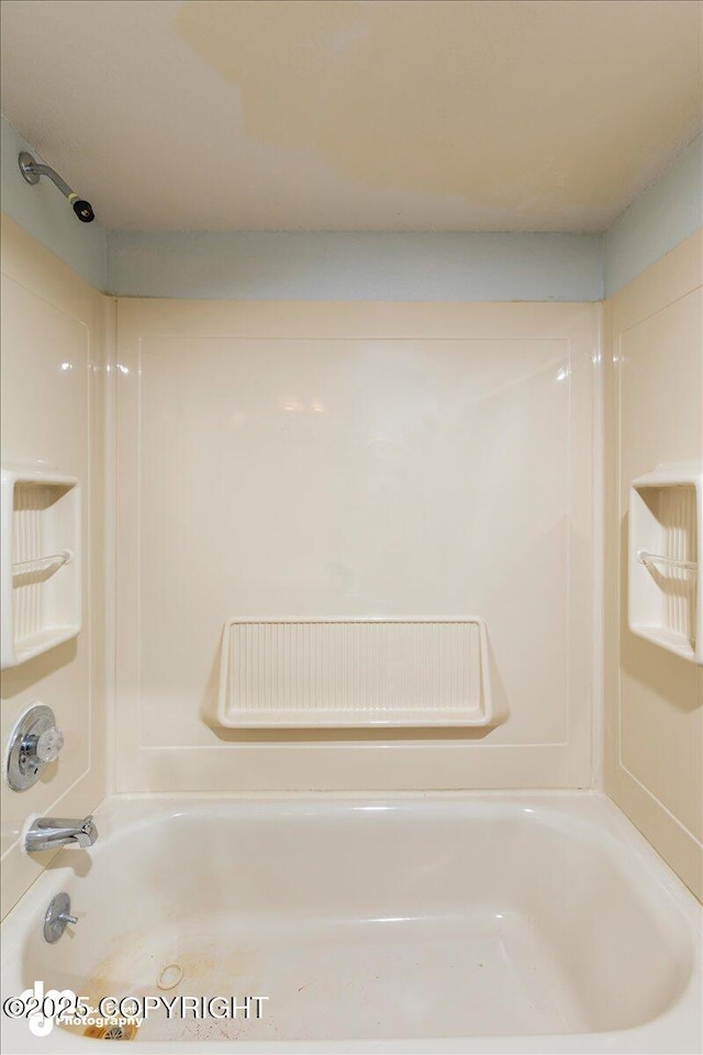 bathroom with shower / bathtub combination