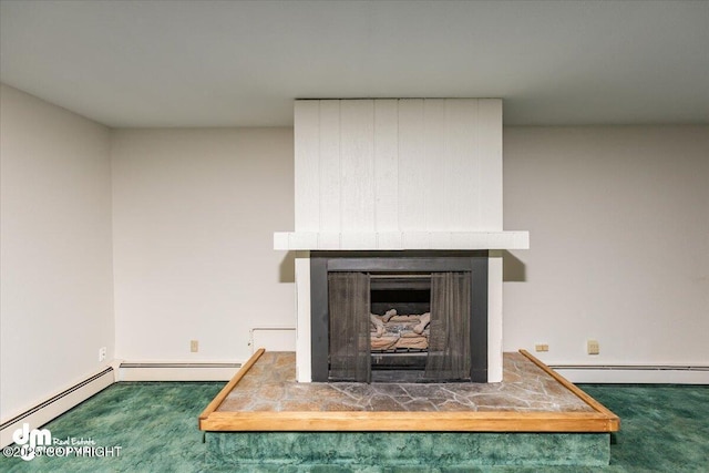 details with a large fireplace, carpet, and a baseboard heating unit