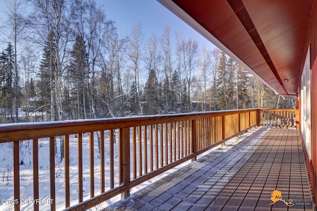 view of snow covered deck
