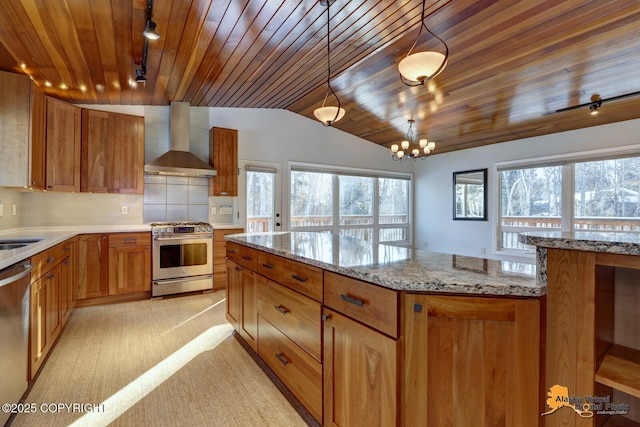 kitchen featuring wood ceiling, wall chimney range hood, lofted ceiling, and stainless steel appliances