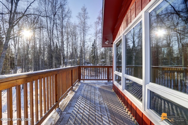 view of snow covered deck