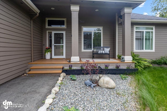 doorway to property featuring a porch