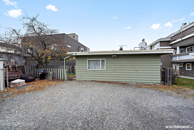 521 N St, Anchorage, AK 99501 - rear view of property featuring fence