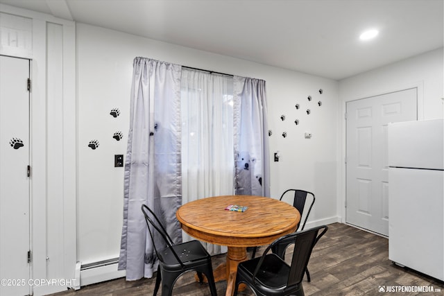 521 N St, Anchorage, AK 99501 - dining room with dark wood-style floors and baseboards