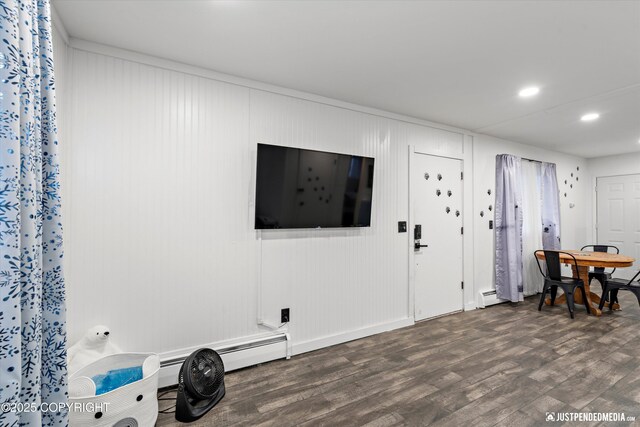 521 N St, Anchorage, AK 99501 - living room with baseboard heating, recessed lighting, and dark wood-type flooring