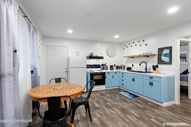 521 N St, Anchorage, AK 99501 - kitchen featuring blue cabinetry, open shelves, a sink, electric range oven, and freestanding refrigerator
