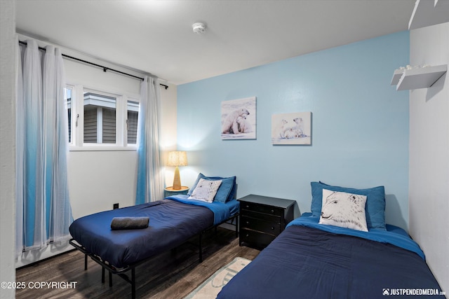 521 N St, Anchorage, AK 99501 - bedroom featuring wood finished floors