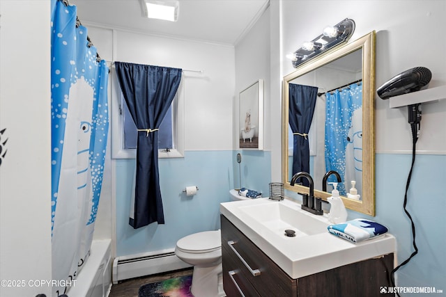 521 N St, Anchorage, AK 99501 - bathroom featuring ornamental molding, toilet, wood finished floors, vanity, and a baseboard heating unit