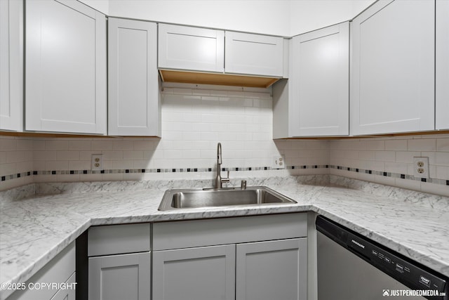 521 N St, Anchorage, AK 99501 - kitchen with dishwasher, a sink, and tasteful backsplash