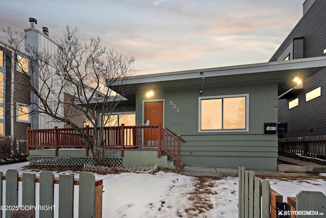 521 N St, Anchorage, AK 99501 - view of front of house with fence and a deck