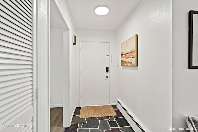 521 N St, Anchorage, AK 99501 - entryway featuring baseboards and baseboard heating