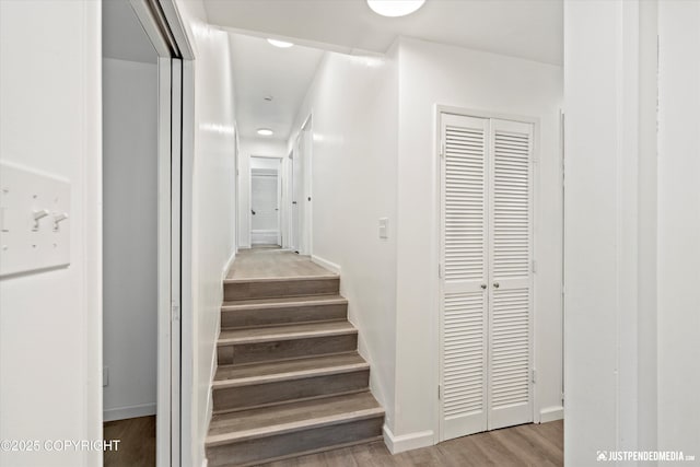 521 N St, Anchorage, AK 99501 - stairs with baseboards and wood finished floors