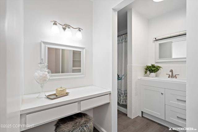 521 N St, Anchorage, AK 99501 - bathroom featuring wood finished floors and vanity