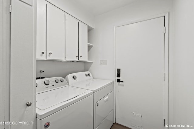 521 N St, Anchorage, AK 99501 - laundry room featuring cabinet space and washer and dryer