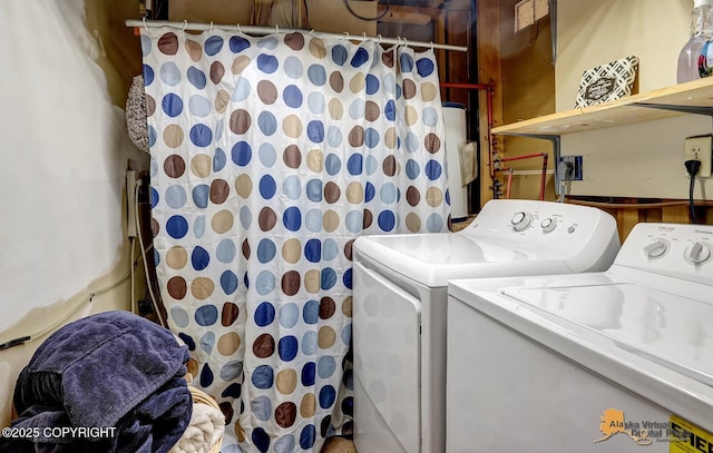 laundry area with laundry area and washer and dryer