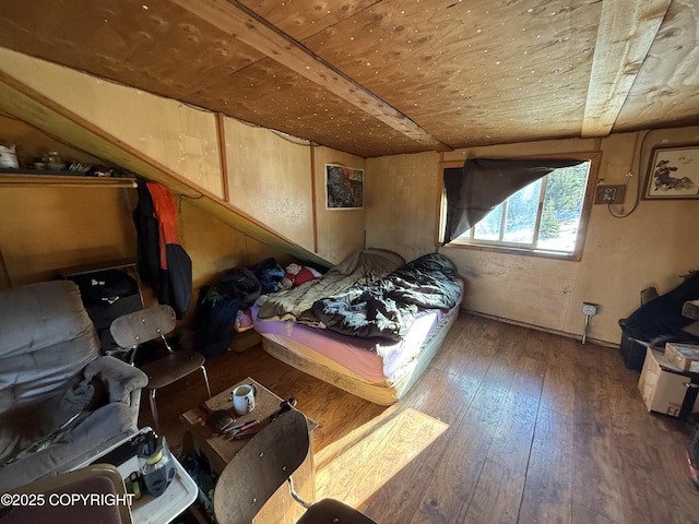 bedroom with wooden ceiling and wood-type flooring