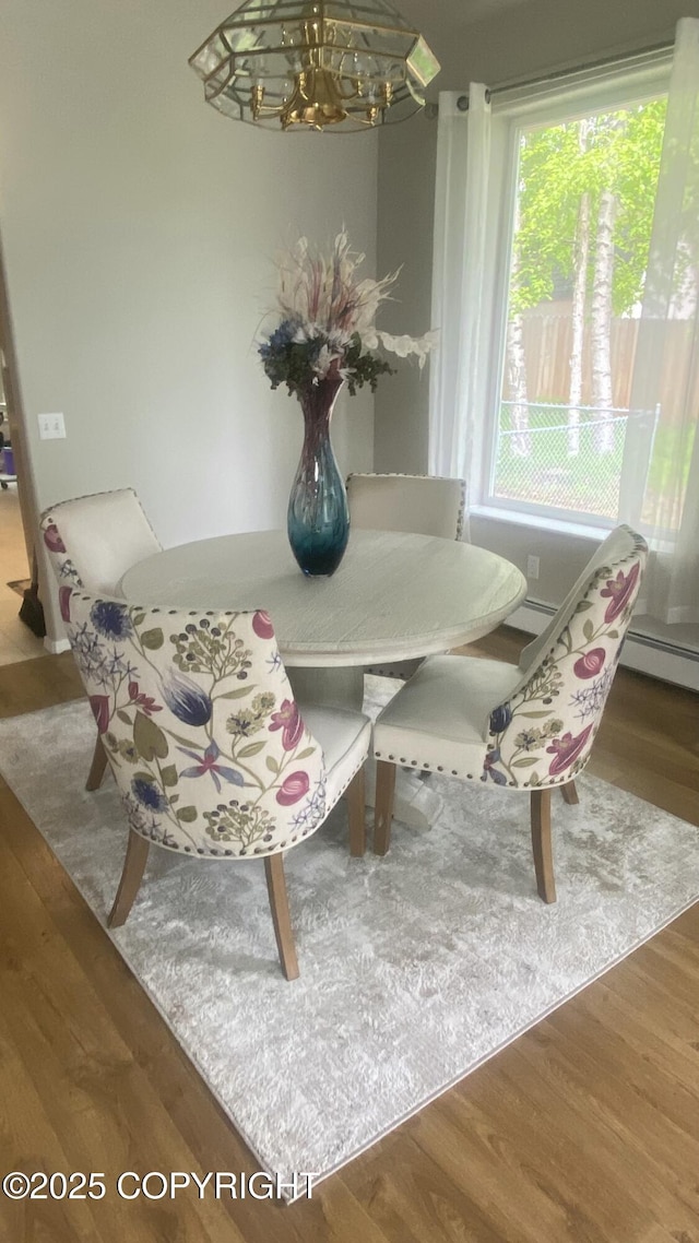 1301 Cross Rd, Anchorage, AK 99515 - dining area with a chandelier and wood finished floors