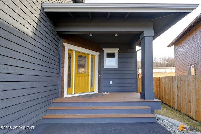 property entrance with fence