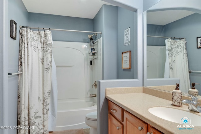 bathroom featuring vanity, toilet, and shower / bathtub combination with curtain