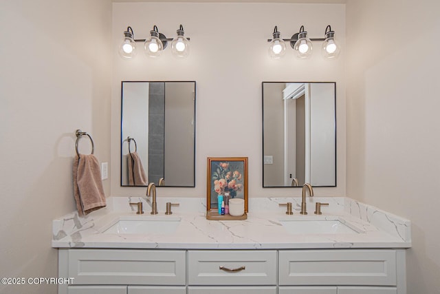 bathroom with double vanity and a sink